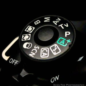 Image of a camera mode dial, where basic canon camera settings start.