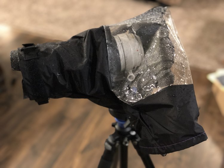 This dslr rain cover comfortably covers large camera rigs.