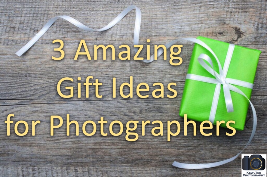 Image of a gift on a wooden backdrop denoting a great gift idea for a photographer.