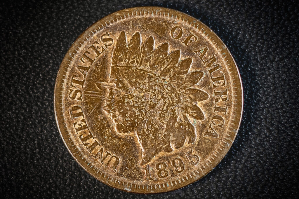 Very close up macro image of an Indian Head Penny minted in 1895.