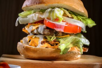 close up photo of a cheese burger