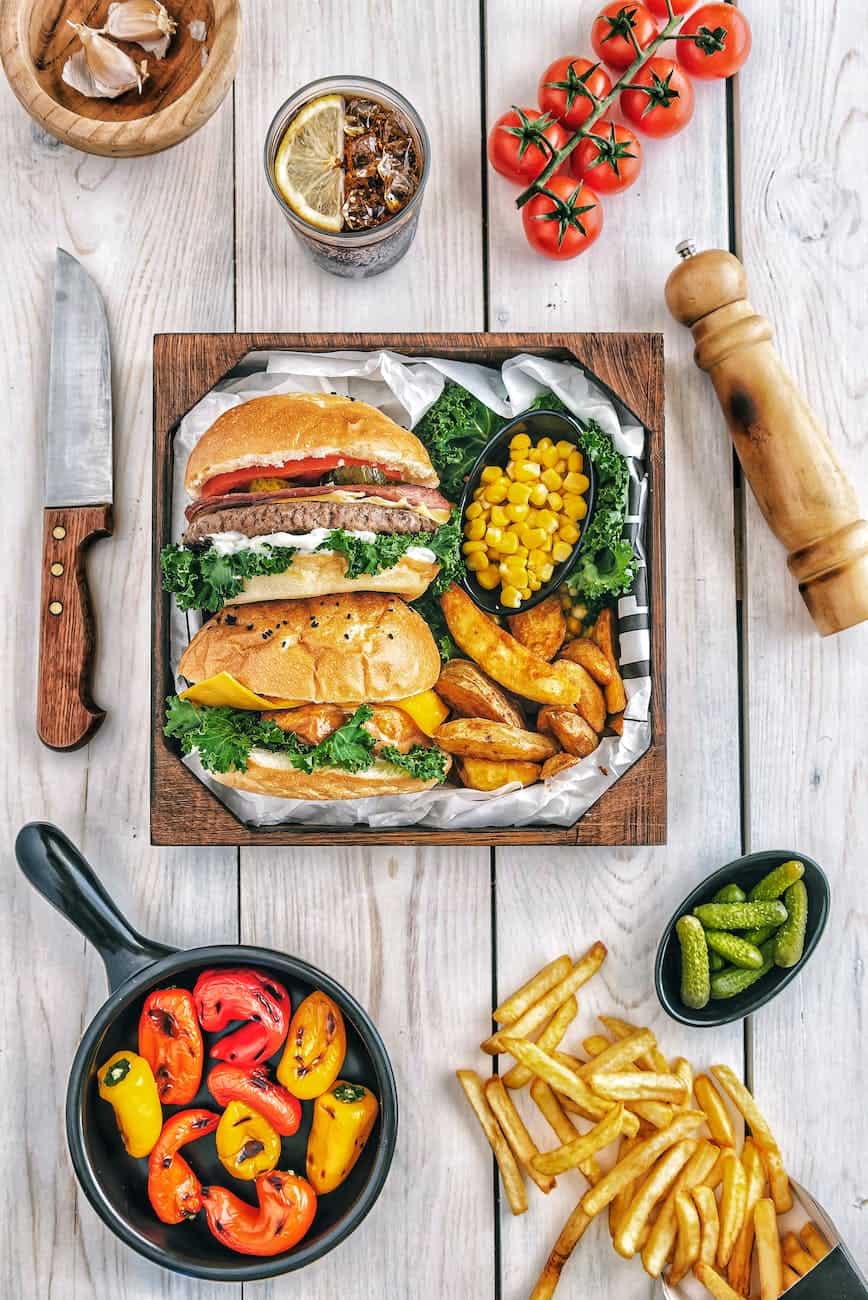 burgers with fries and tomatoes