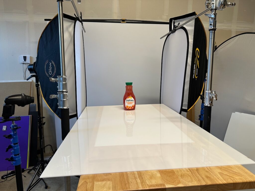 Behind the scenes of pack shot juice bottle product photography