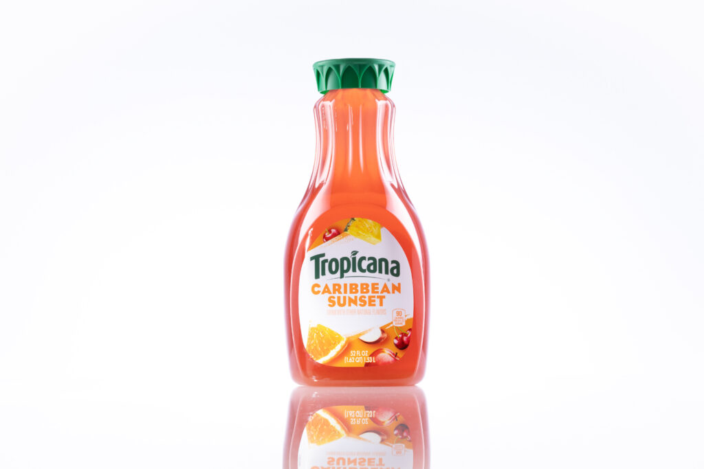 pack shot of juice bottle on white surface and background