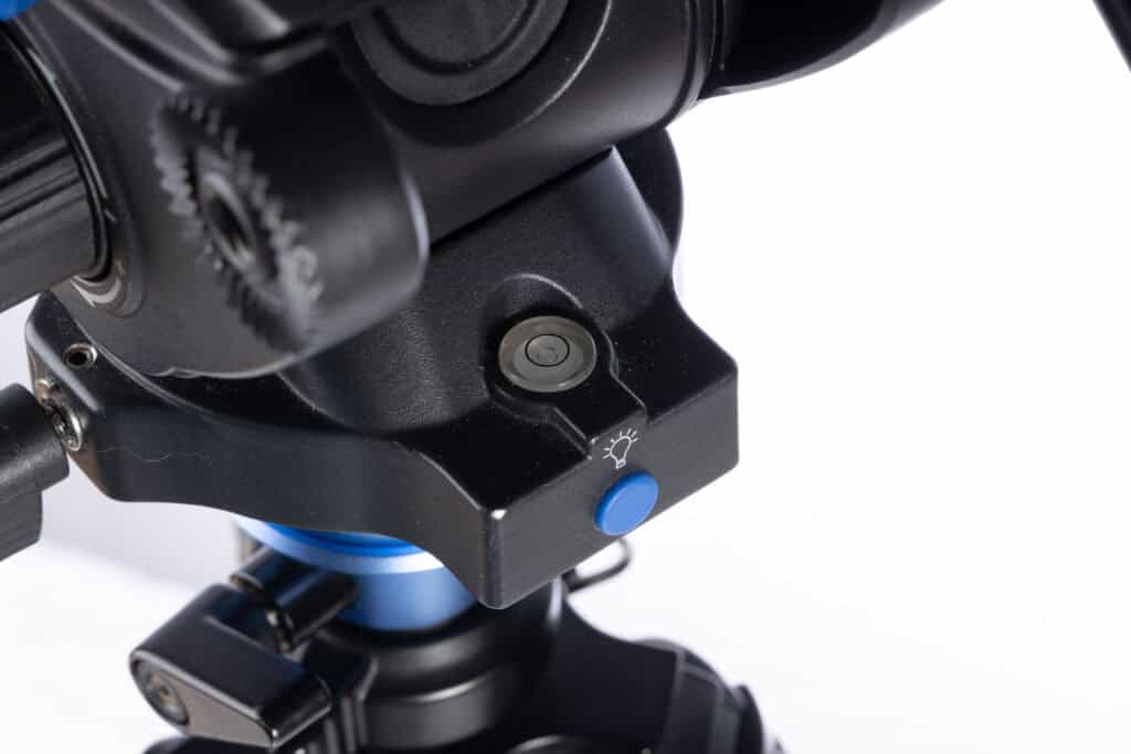 Close-up of the Benro S6 PRO fluid head with illuminated bubble level, showing its design optimized for horizontal shooting but limited for vertical orientation.